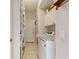 Laundry room with washer, dryer, shelving, and extra storage at 100 Moss Ln, Davenport, FL 33837