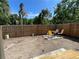 Small backyard with a patio and wooden fence at 824 Park Lake Pl # 824, Maitland, FL 32751