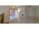 Bright living room with tile floors, fireplace, and sliding glass doors at 824 Park Lake Pl # 824, Maitland, FL 32751