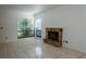 Living room with tile floors and a brick fireplace at 824 Park Lake Pl # 824, Maitland, FL 32751
