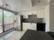 Modern kitchen with stainless steel appliances and a tile backsplash at 824 Park Lake Pl # 824, Maitland, FL 32751