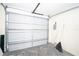 Attached garage with an automatic garage door at 824 Park Lake Pl # 824, Maitland, FL 32751