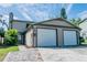 Two-story house with a double-car garage and well-maintained landscaping at 824 Park Lake Pl # 824, Maitland, FL 32751