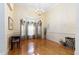 Formal dining room with hardwood floors and large windows at 840 Coach Lamp Ct, Sanford, FL 32771