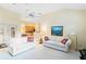 Living room with two sofas and view of the kitchen and patio at 840 Coach Lamp Ct, Sanford, FL 32771