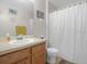 Clean bathroom with a shower/tub combo and vanity at 617 Brockton Dr, Kissimmee, FL 34758