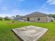 Large backyard with spacious grassy area, shed, and above ground pool at 617 Brockton Dr, Kissimmee, FL 34758