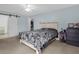 Spacious bedroom with large windows and ceiling fan at 617 Brockton Dr, Kissimmee, FL 34758