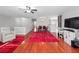 Bright living area featuring hardwood floors and a dining area at 1001 Via Capri Ln # 204, Celebration, FL 34747