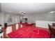 Spacious living room with hardwood floors and comfy seating at 1001 Via Capri Ln # 204, Celebration, FL 34747