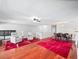 Hardwood floor living room with two seating areas at 1001 Via Capri Ln # 204, Celebration, FL 34747