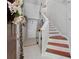 Spacious entryway with tiled floor, staircase, and decorative accents at 1001 Via Capri Ln # 204, Celebration, FL 34747