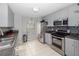 Modern kitchen with stainless steel appliances at 1001 Via Capri Ln # 204, Celebration, FL 34747