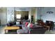 Living room with sectional sofa, dining area, and kitchen views at 3007 Bloomsbury Dr, Kissimmee, FL 34747