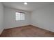 Bright bedroom with neutral walls and carpet at 10233 Serotina Ct, Orlando, FL 32832