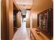 Bright entryway with tile floor, decorative wall art, and wood console table at 1821 Morning Star Dr, Clermont, FL 34714