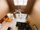 Open concept living room and dining area with high ceilings and patio access at 1821 Morning Star Dr, Clermont, FL 34714