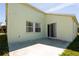 Back patio with sliding glass doors at 3260 Marshfield Preserve Way, Kissimmee, FL 34746