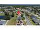 Property's aerial view shows location in a residential neighborhood at 3260 Marshfield Preserve Way, Kissimmee, FL 34746
