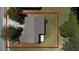 Aerial view of house and surrounding area, showing landscaping and driveway at 3260 Marshfield Preserve Way, Kissimmee, FL 34746