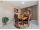 Formal dining room with ornate wooden table and chairs at 3260 Marshfield Preserve Way, Kissimmee, FL 34746