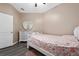 Elegant bedroom with white dresser and heart-shaped mirror at 3260 Marshfield Preserve Way, Kissimmee, FL 34746