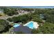 Community pool and playground with water features at 3260 Marshfield Preserve Way, Kissimmee, FL 34746