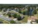 Aerial view of house and surrounding neighborhood at 3260 Marshfield Preserve Way, Kissimmee, FL 34746