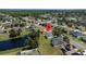Property's aerial view shows location in a residential neighborhood at 3260 Marshfield Preserve Way, Kissimmee, FL 34746