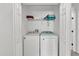 Convenient laundry room with washer and dryer in the unit at 2732 Oakwater Dr # 101, Kissimmee, FL 34747