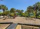 playground with climbing structures and slide at 2732 Oakwater Dr # 101, Kissimmee, FL 34747