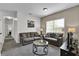 Cozy living room featuring two sofas, a coffee table and carpet at 2732 Oakwater Dr # 101, Kissimmee, FL 34747