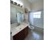 Clean bathroom with a single sink vanity and shower/tub combo at 7953 Sea Pearl Cir, Kissimmee, FL 34747