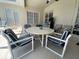 Covered patio with outdoor dining furniture at 7953 Sea Pearl Cir, Kissimmee, FL 34747