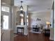 Living area with hardwood floors, neutral color palette and ample natural light at 7953 Sea Pearl Cir, Kissimmee, FL 34747