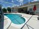 Inviting screened pool area with patio furniture at 7953 Sea Pearl Cir, Kissimmee, FL 34747