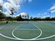 Full-size outdoor basketball court with clear markings at 2913 Eagle Lake Dr, Orlando, FL 32837