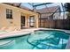 Inviting screened-in pool with surrounding patio at 2726 Randal Way, Kissimmee, FL 34743