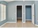 Simple bedroom with tile floors and neutral walls at 2726 Randal Way, Kissimmee, FL 34743