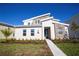 Modern two story home with stone accents and landscaping at 4577 Target Blvd, Kissimmee, FL 34746