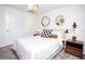 Spacious bedroom with a queen bed and stylish decor at 4577 Target Blvd, Kissimmee, FL 34746