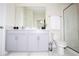 Bathroom with double vanity and shower at 4577 Target Blvd, Kissimmee, FL 34746