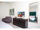 Bedroom with dresser, comfy chair, and large mirror at 4577 Target Blvd, Kissimmee, FL 34746