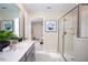 Bathroom with vanity, large mirror, and shower at 4577 Target Blvd, Kissimmee, FL 34746