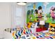 ' bedroom with twin beds and Mickey Mouse wall at 4577 Target Blvd, Kissimmee, FL 34746