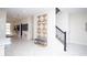 Elegant entryway with stylish wall art and a bench at 4577 Target Blvd, Kissimmee, FL 34746