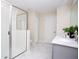 Elegant bathroom with double vanity, large shower, and marble floors at 4577 Target Blvd, Kissimmee, FL 34746