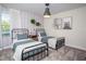 Charming bedroom with two twin beds and unique wall decor at 4577 Target Blvd, Kissimmee, FL 34746
