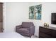 Bedroom featuring a comfortable chair and wall art at 4577 Target Blvd, Kissimmee, FL 34746