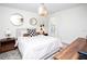 Bright bedroom featuring a comfortable bed and modern nightstands at 4577 Target Blvd, Kissimmee, FL 34746